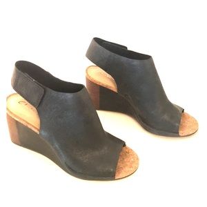 Black Clark’s Platform Sandals.